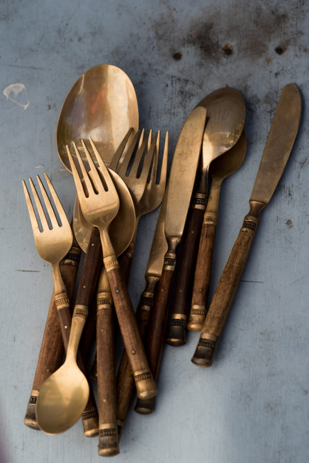 brass and woodforks, spoons and knives